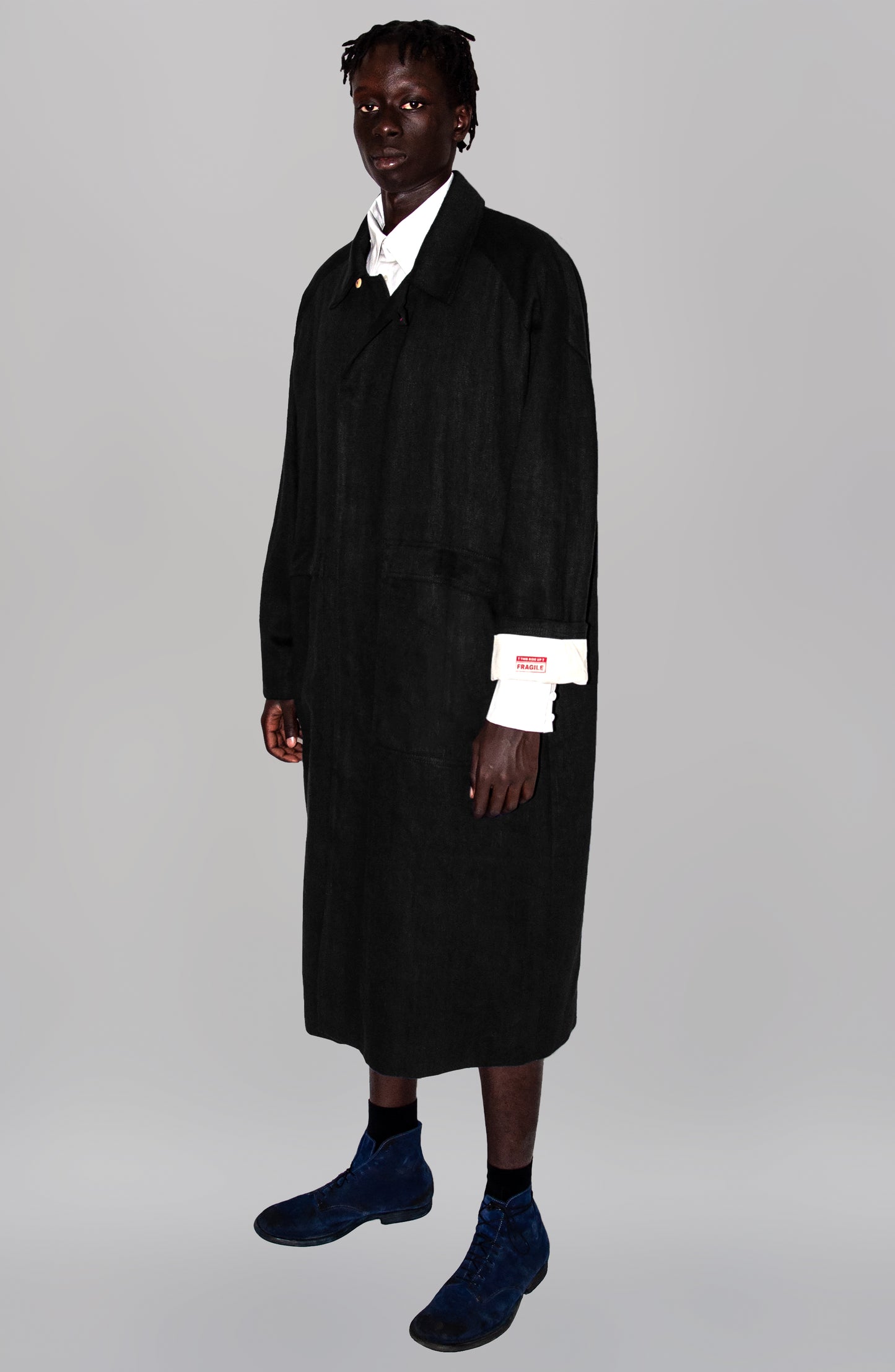 THE 'SIDE UP' COAT IN BLACK