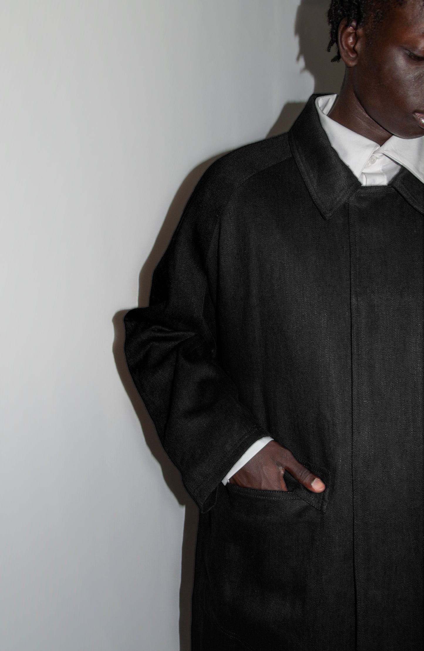THE 'SIDE UP' COAT IN BLACK