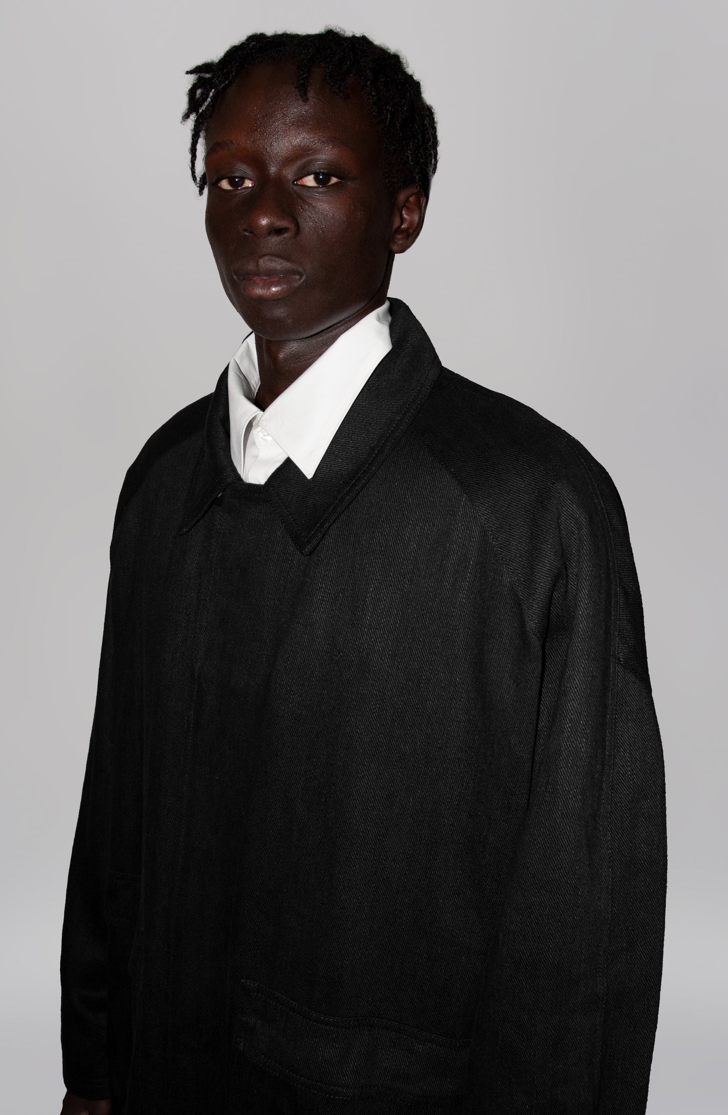 THE 'SIDE UP' COAT IN BLACK