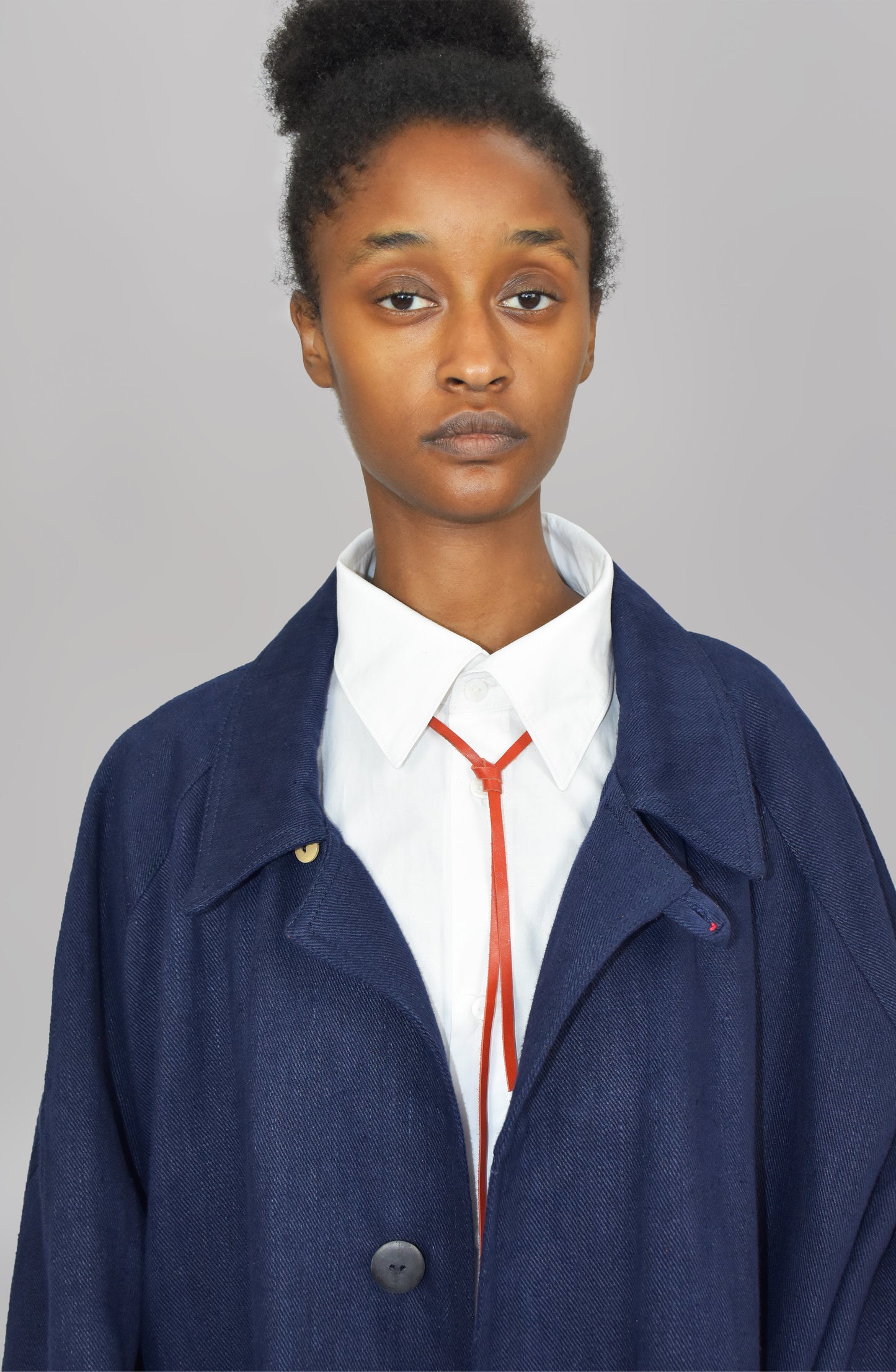 THE 'SIDE UP' COAT IN DEEP BLUE