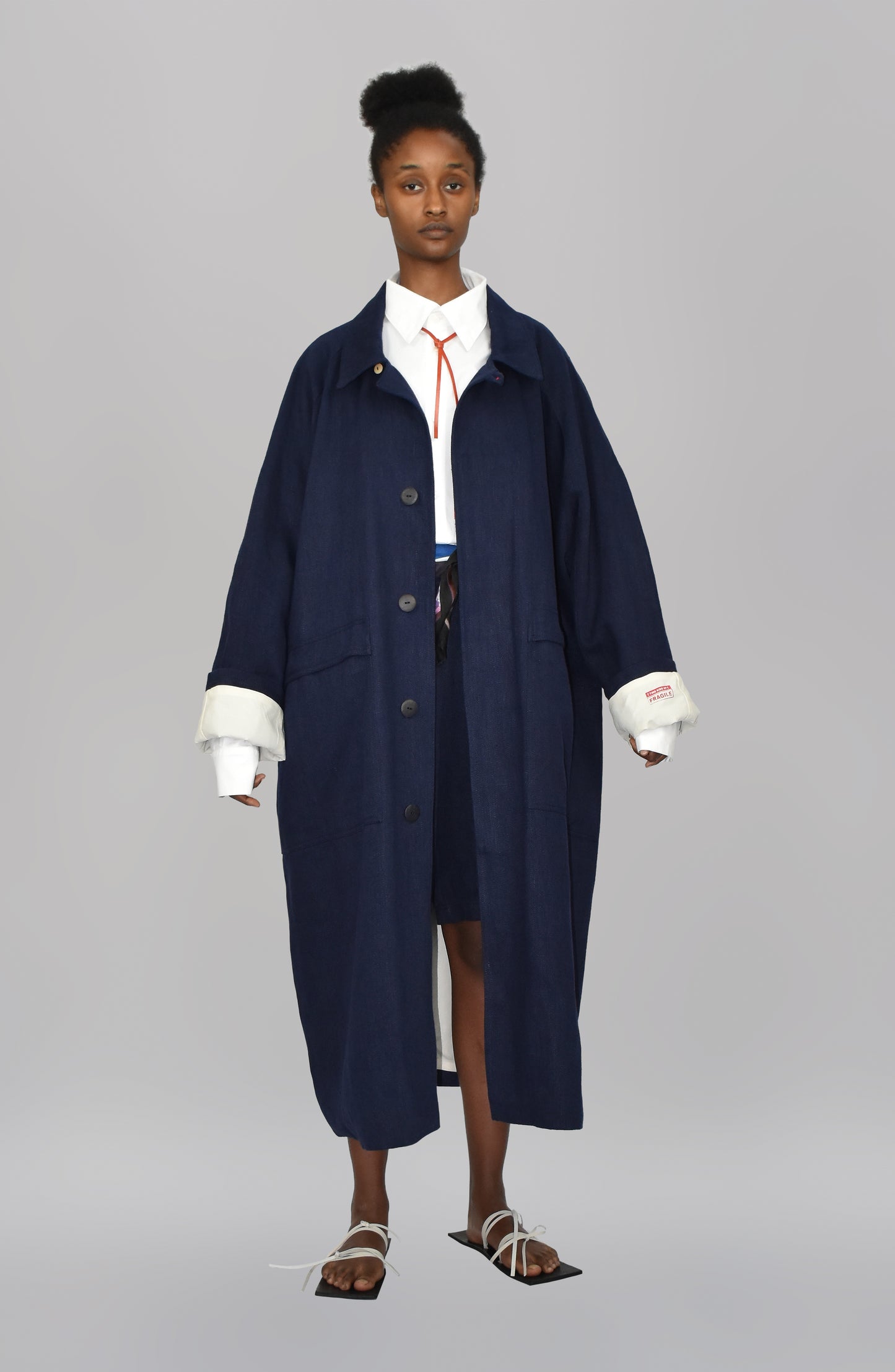 THE 'SIDE UP' COAT IN DEEP BLUE